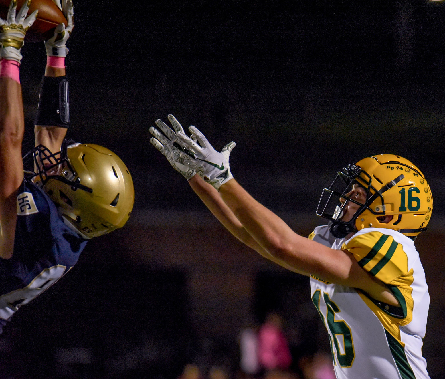 Helias' defensive back Griffen Bushjost intercepts a pass intending for Brant Bowers